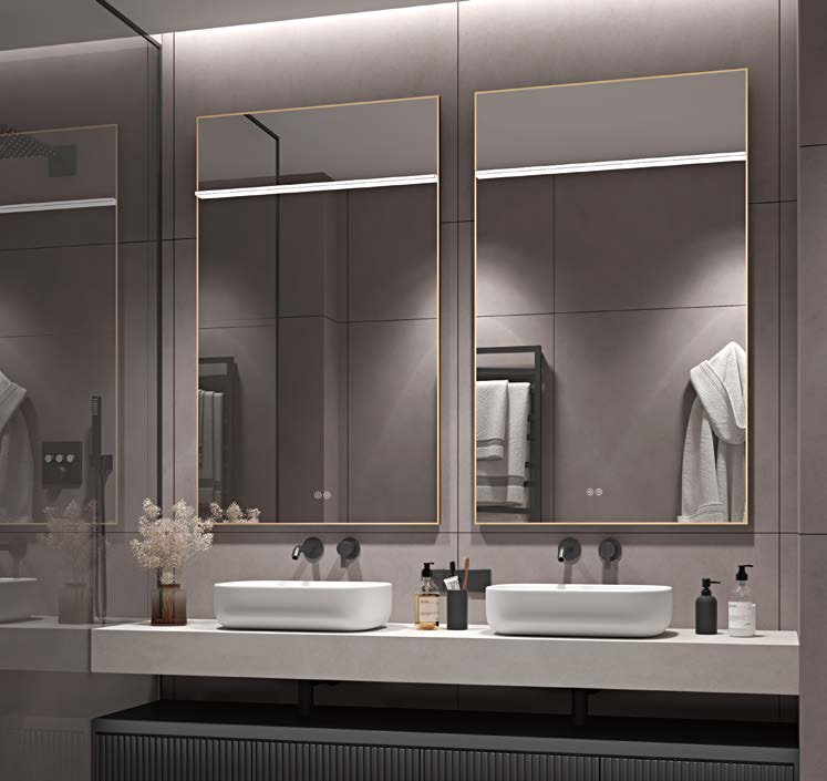 Framed illuminated mirrors above a contemporary double vanity